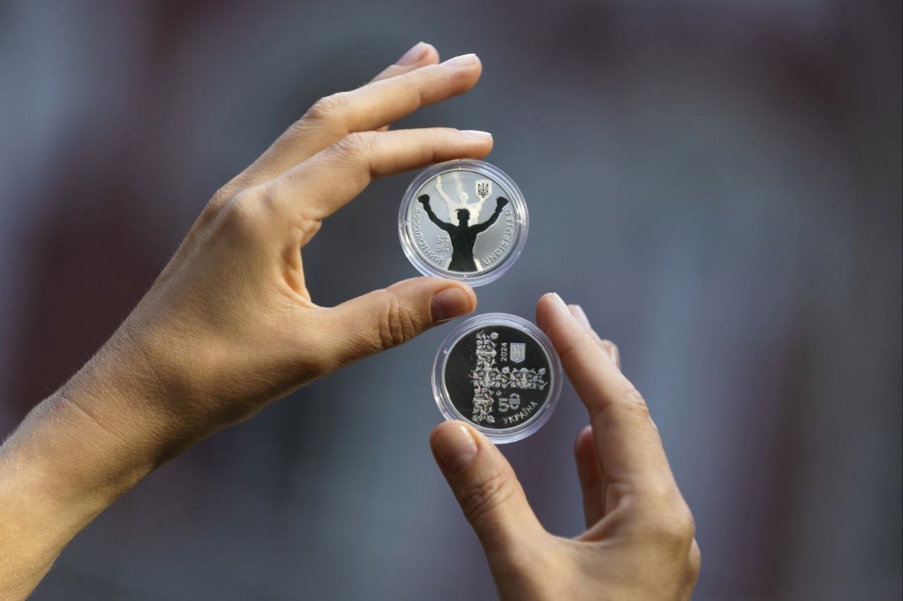 Монета Усика