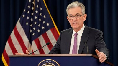 ФРС скорочує антикризову програму з викупу активів вдвічі