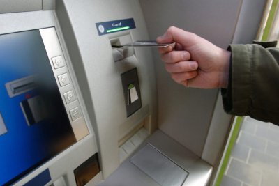 Нацбанк продал свои банкоматы Ощадбанку