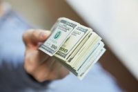 Нацбанк за эту неделю скупил рекордный объем валюты